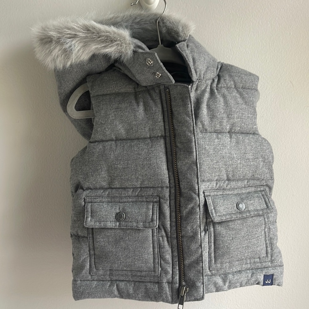 Puffer vest with faux fur trimmed hood